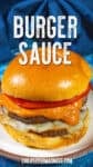 A cheeseburger with tomato, melted cheese, and thick orange Easy Burger Sauce on a shiny bun, with BURGER SAUCE text above and chilipeppermadness.com below.