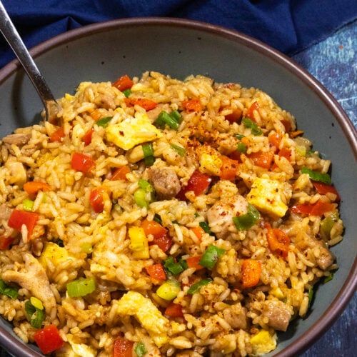 A large bowl of Peruvian Fried Rice with Chicken (Arroz Chaufa)