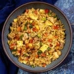 A bowl of satisfying Arroz Chaufa (Peruvian Fried Rice with Chicken), ready to eat